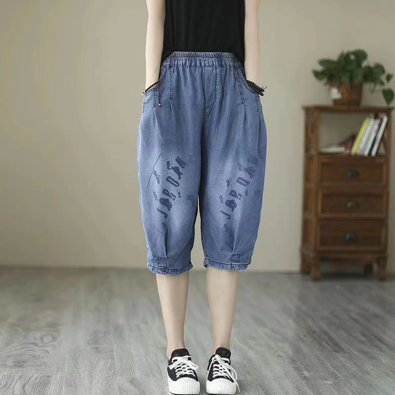 夏季女装大码薄款字母水洗天丝牛仔裤休闲松紧腰哈伦六分裤女