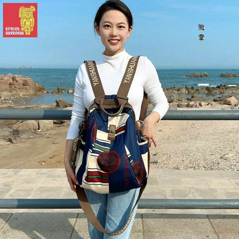 《阎双创造&徽章》原创正品防水多功能时尚出游通勤百搭潮流双肩包