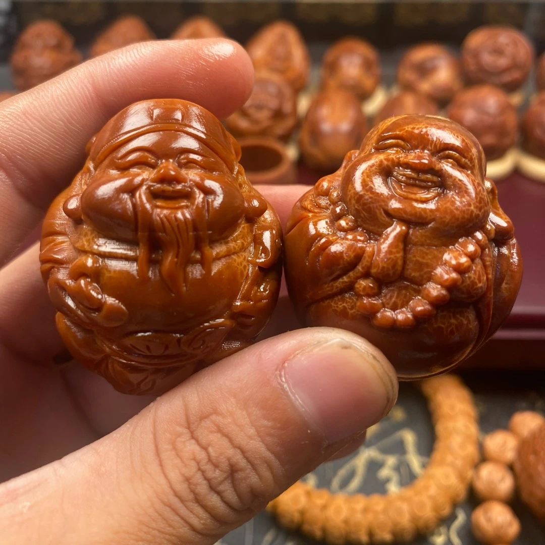 巴西橄榄核雕刻财迷手把件