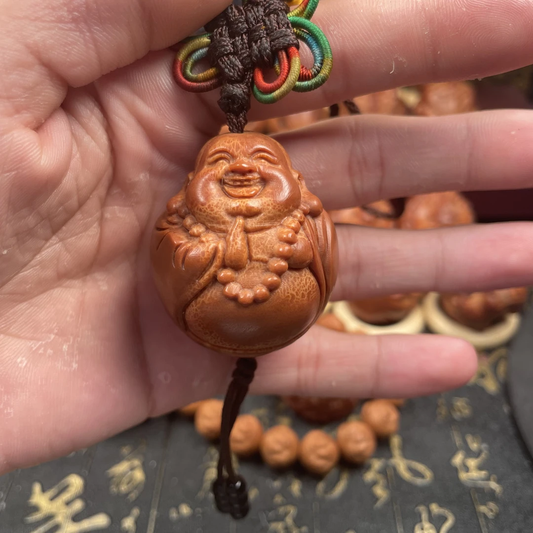 巴西橄榄核雕刻弥勒手把件