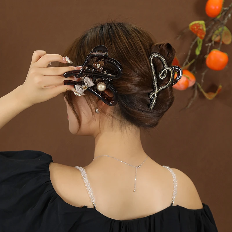 蝴蝶结爱心抓夹女高级感法式发夹后脑勺夹子头饰鲨鱼夹小众设计感