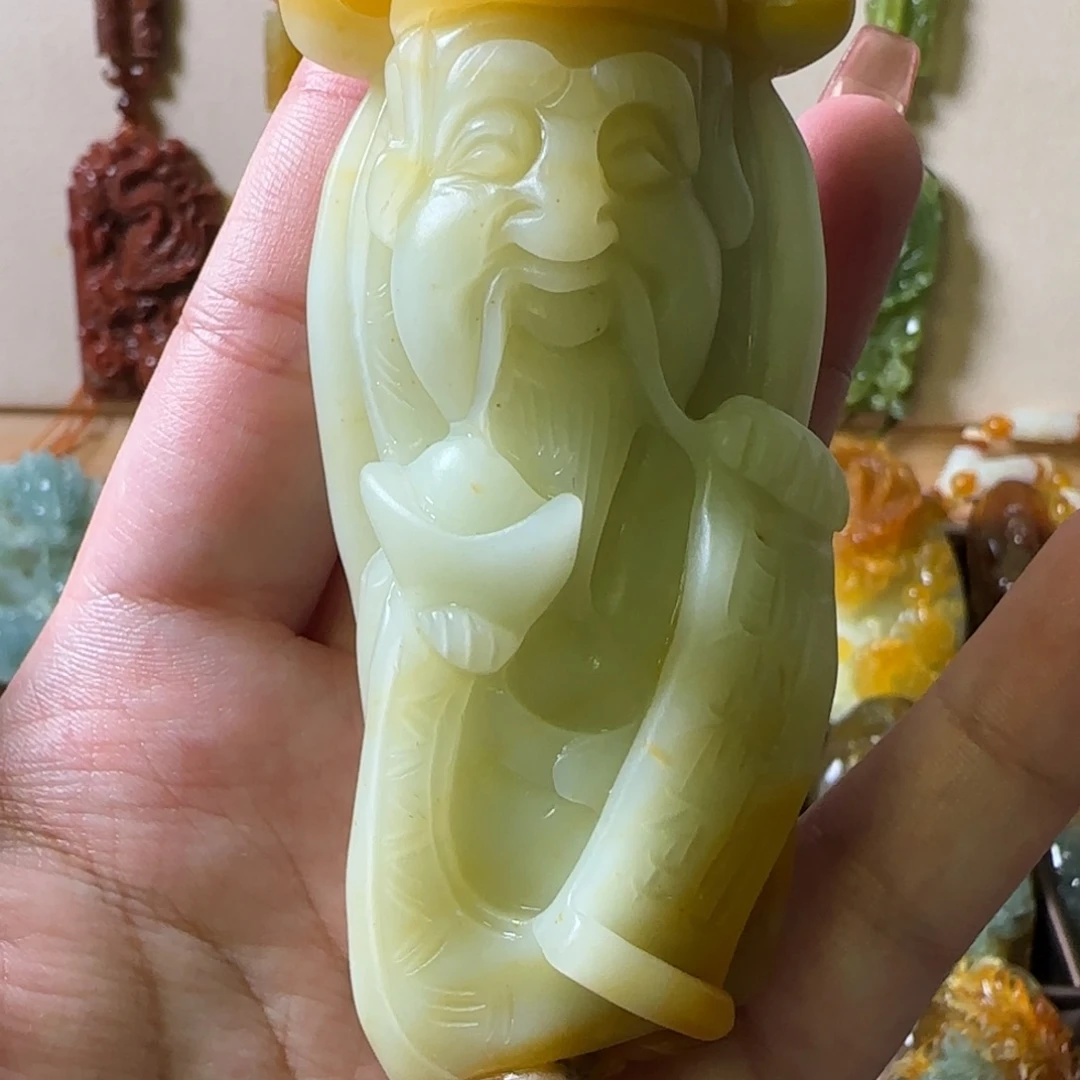 蛇纹石玉手把件合金卫**火