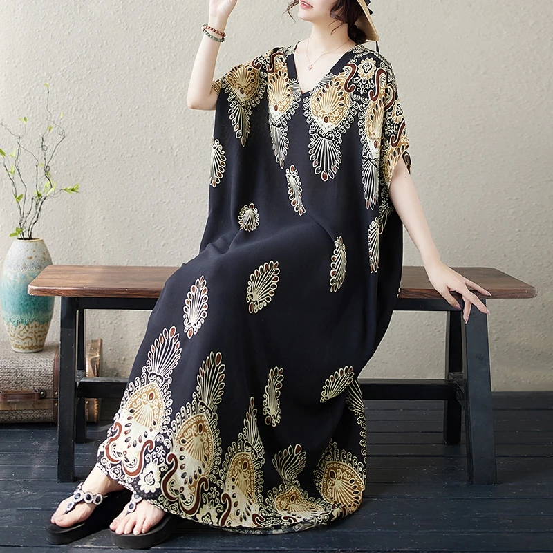 200斤大码女装V领小清新碎花显瘦棉绸复古波西米亚度假风洋气长裙