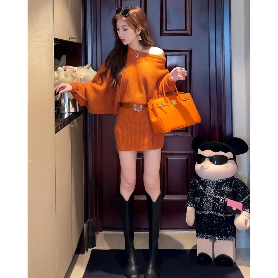 法式高级感针织连衣裙女秋新款时尚气质收腰露肩设计感蝙蝠袖短裙