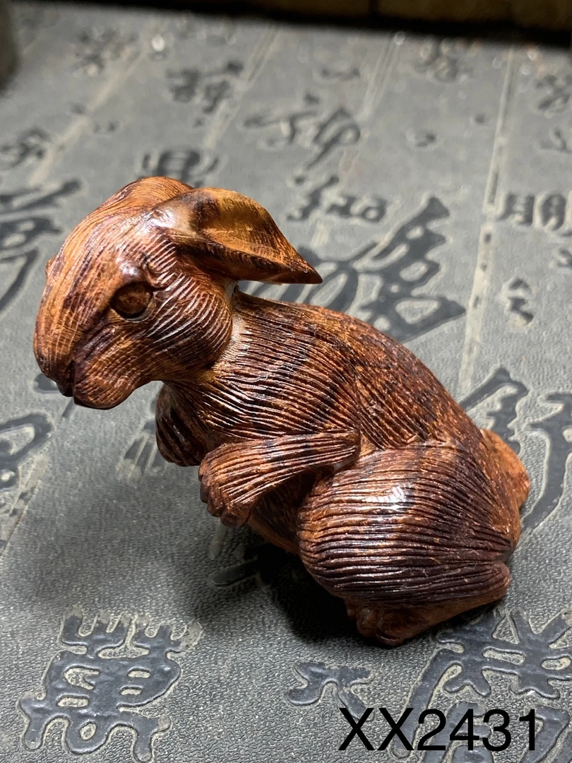 XX2431越南黄花梨兔子雕刻件长宽高2.6/3.3/4.8CM,净重19克