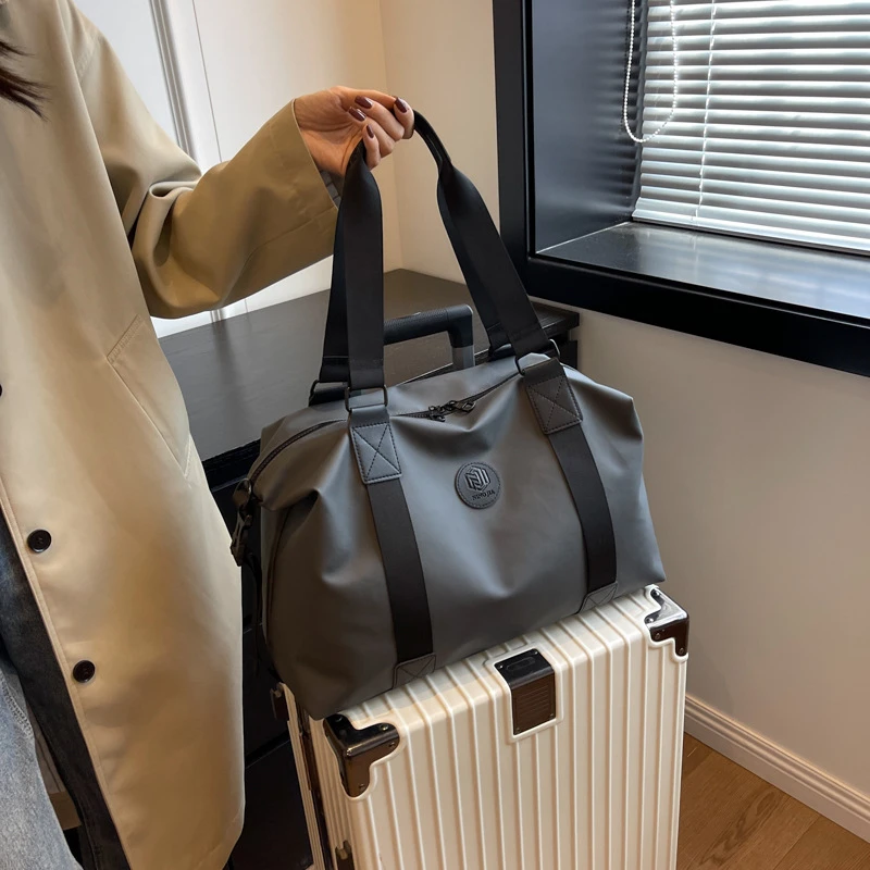 大容量外出旅游行李包运动包旅行包男款手提牛津布防泼水健身包