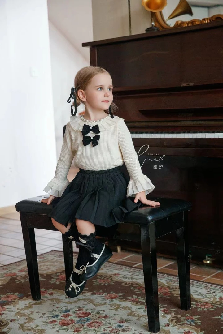 童装2024韩版套装女童双蝴蝶结蕾丝上衣黑色百褶裙250051