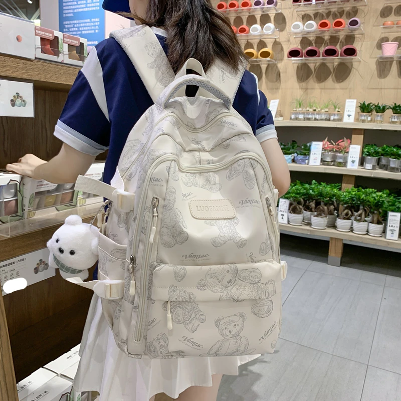 百搭女初中日系可爱印花小熊2023新款大容量高中生大学生双肩包
