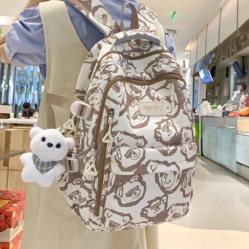 书包印花女减负轻便大容量初中生小学生可爱背包高中生电脑双肩包