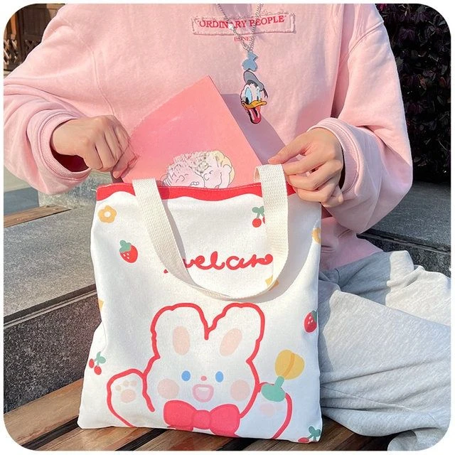 学生帆布手提袋日系小学生手提书袋单肩包帆布包学生装书补习袋