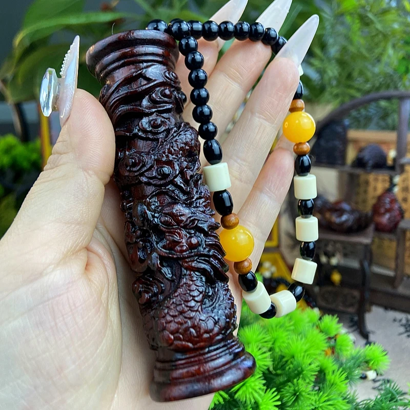 盘龙柱紫檀木手把件