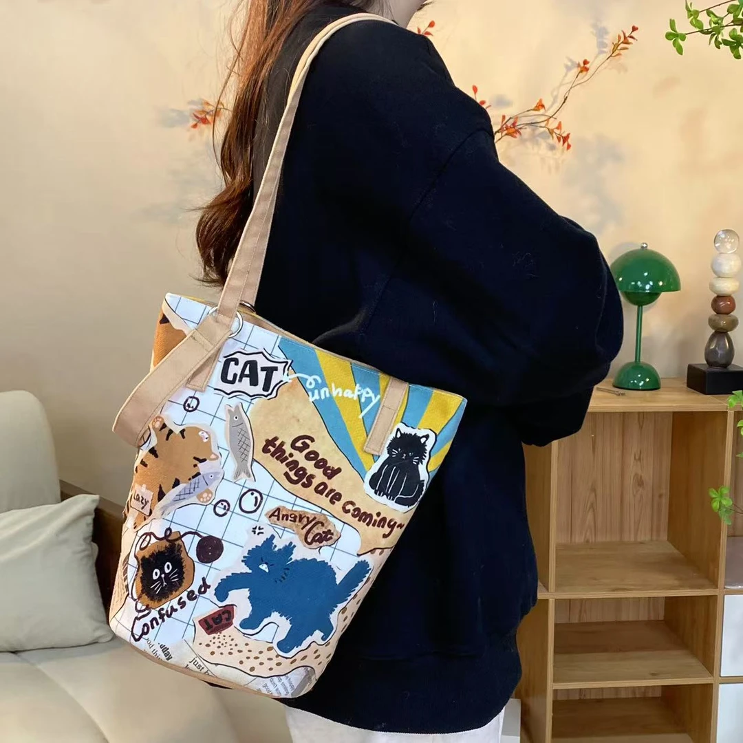 尼睿x小短腿 原创复古拼接单肩包可爱小猫水桶包个大容量帆布包女