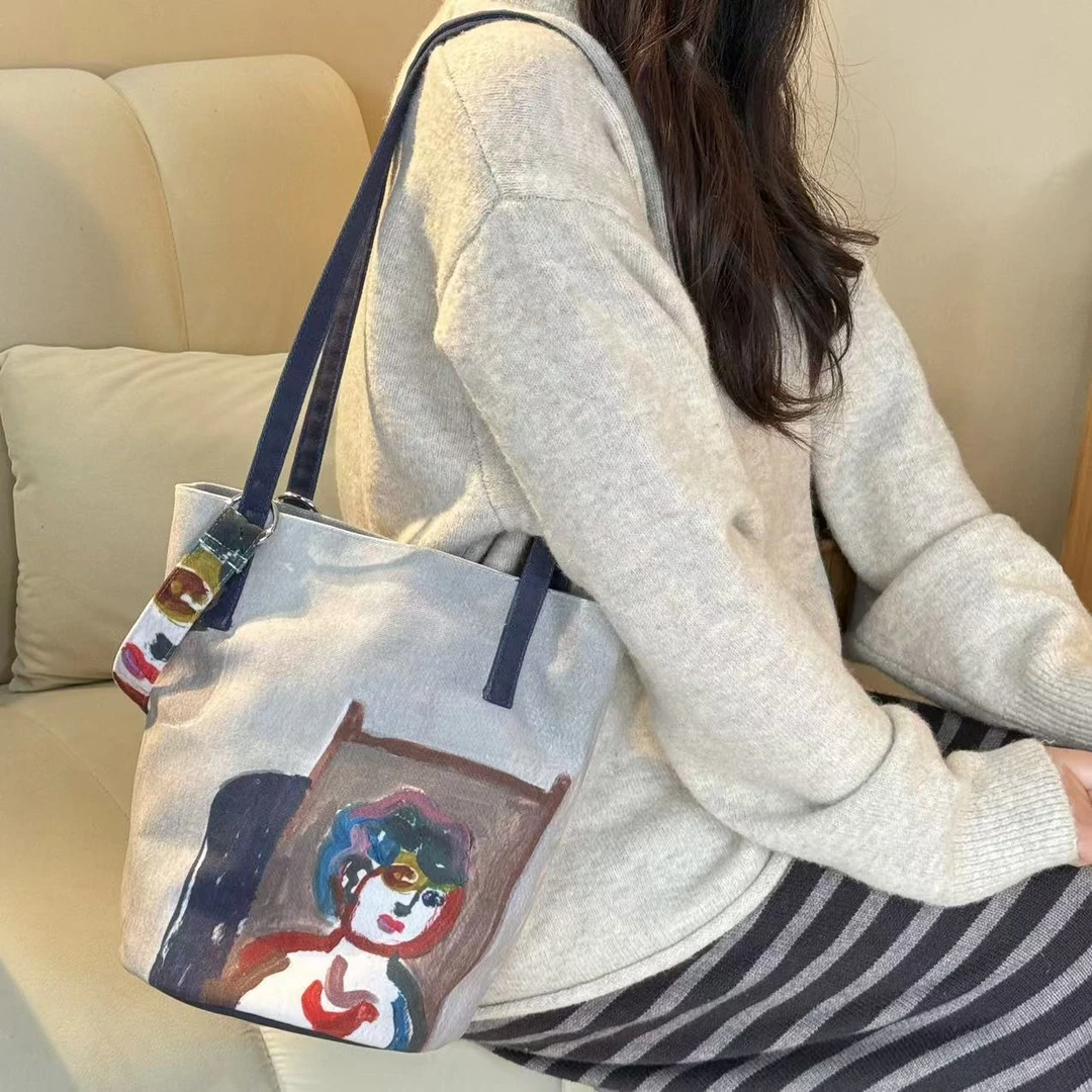 弘娜×YIFEI 合作款艺术生抽象文艺个性清新日常通勤手提水桶包
