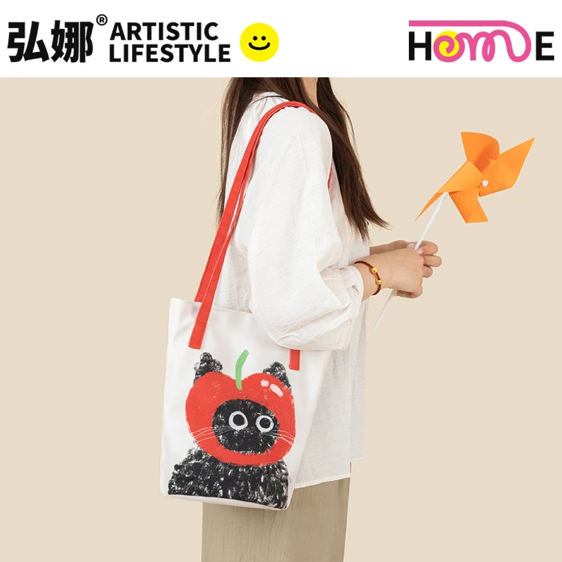 弘娜设计师原创苹果小猫细肩带单肩手提水桶包时尚便携大容量女AC