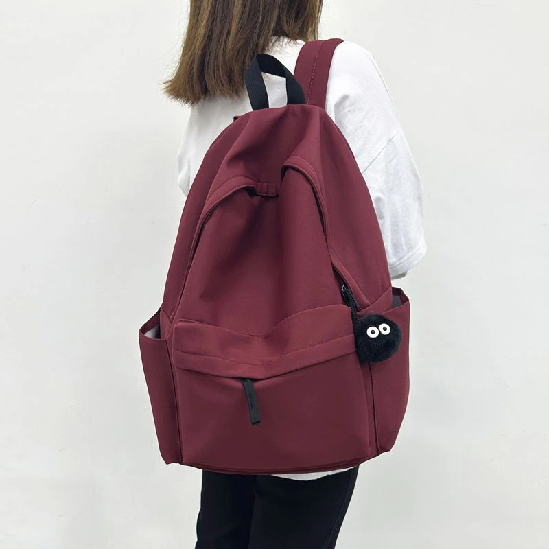 新疆西藏包邮书包女初中生高中学生大学生简约百搭大容量双肩包
