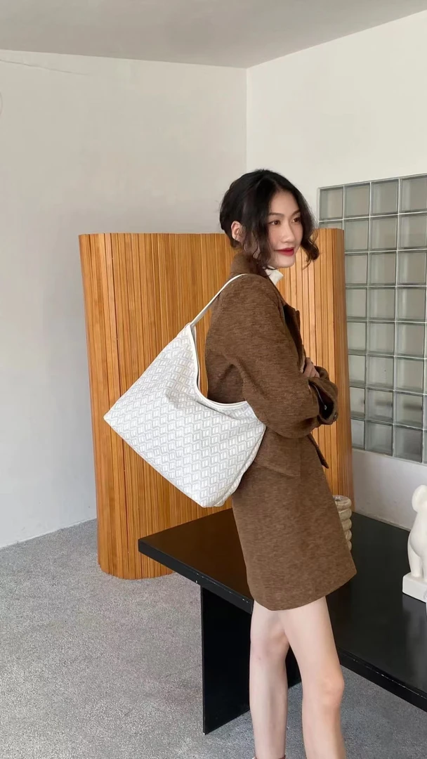 EMO/一莫2023春夏新款狗牙HOBO流浪包单肩小众设计腋下包包拉链