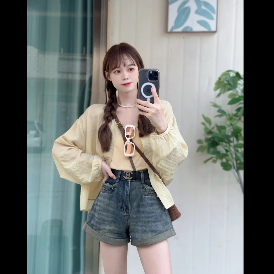 拾一 流苏复古腰带卷边牛仔短裤