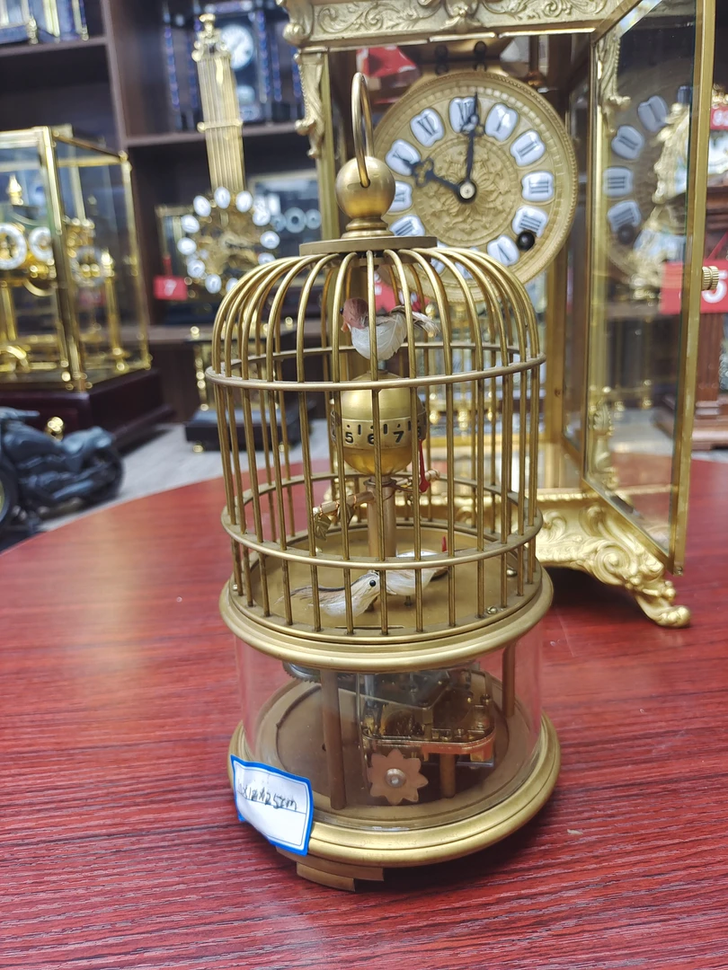 浮雕仿古工艺中古时尚趣味钟表机械动力摆件复古金色客厅欧式精致