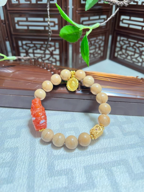 《玥玥饰品》有钱来，大黑黄米手串0152