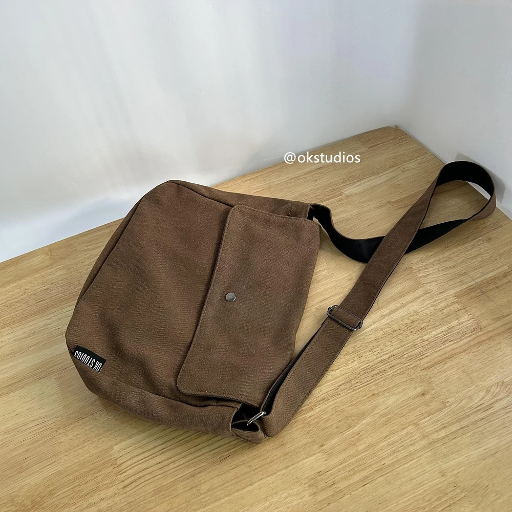 OK小众设计纯色极简复古做旧翻盖邮差包女学院风斜挎帆布书包男潮