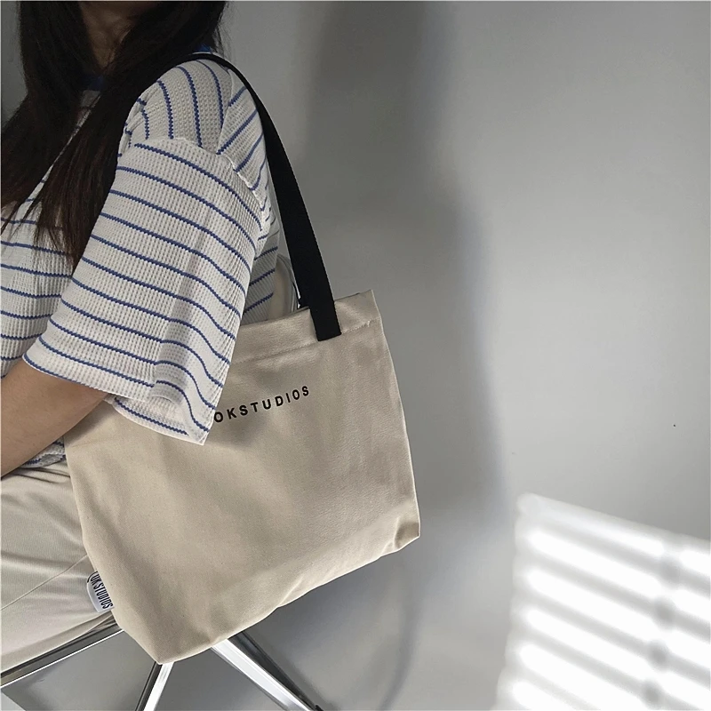 OK设计米白单肩帆布包大容量文艺清新极简ins通勤手提背包袋男女