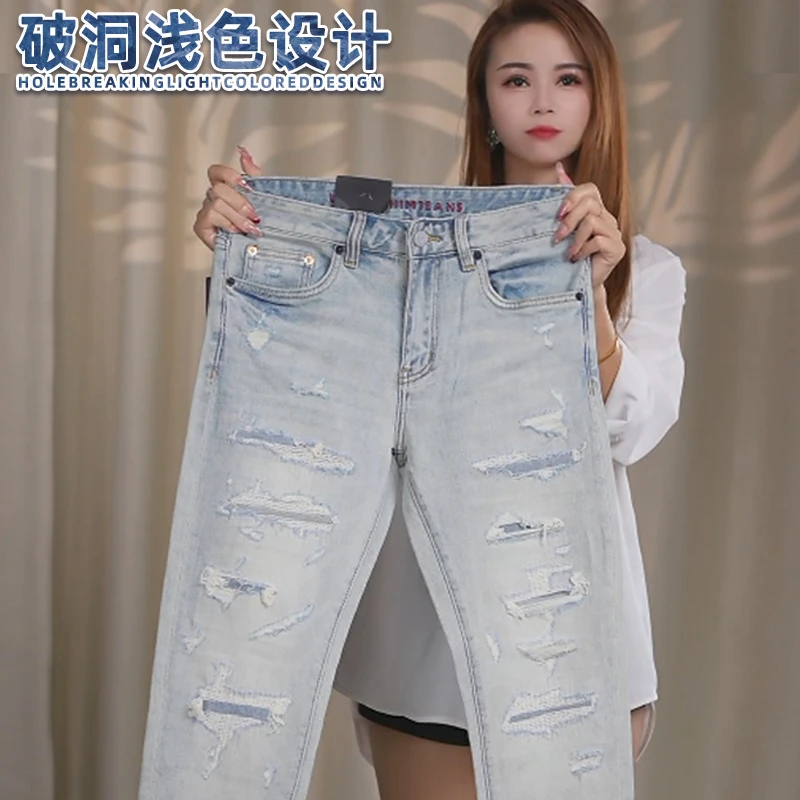 假破洞牛仔裤男士浅蓝色欧货修身小脚裤春季新款潮流轻奢裤子男装