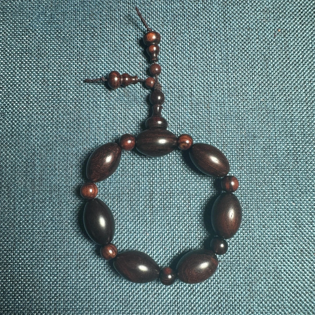 海南黄花梨紫油梨橄榄球珠微瑕文玩手串  非七天无理由！！