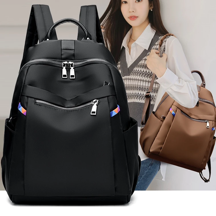 正版双肩包女新款时尚牛津布大容量旅行背包女士百搭帆布学生书包