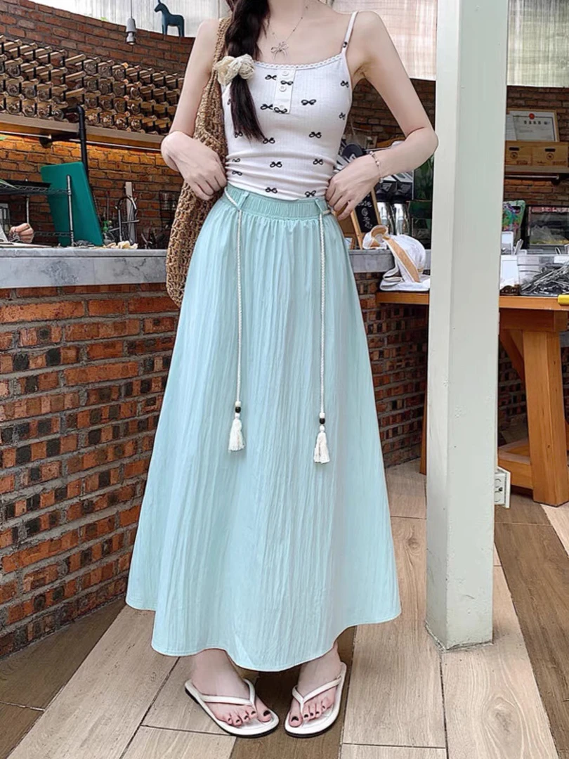 薄荷曼波风抽绳半身裙女度假风高腰显瘦大裙摆遮胯a字长裙子夏季
