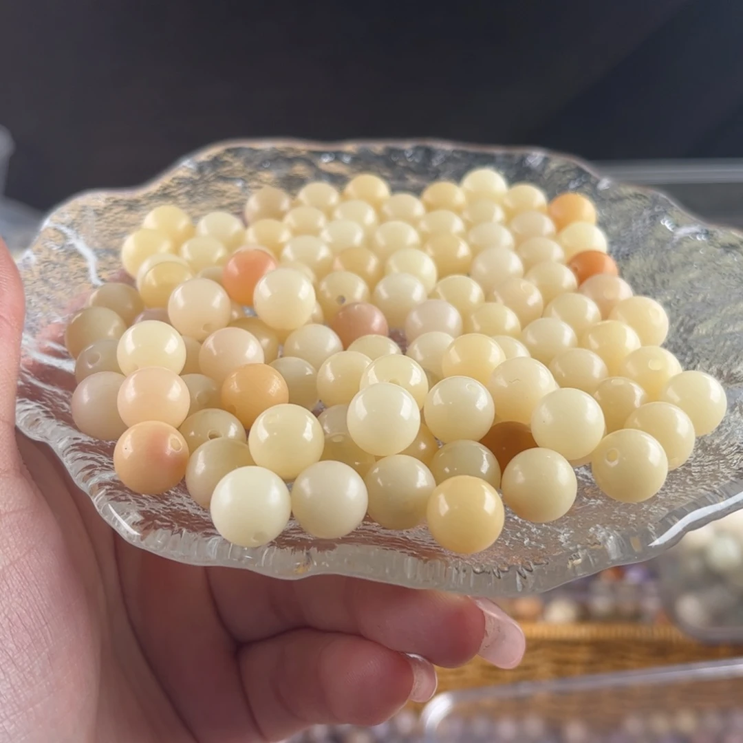 【闪购商品】白玉菩提吊坠a10mm100颗奶黄