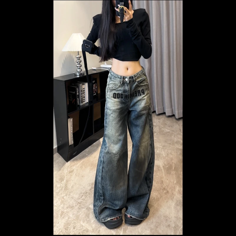 现货 66558牛皮纸质感扎染牛仔裤2025春夏新刺绣高品质显瘦裤大码