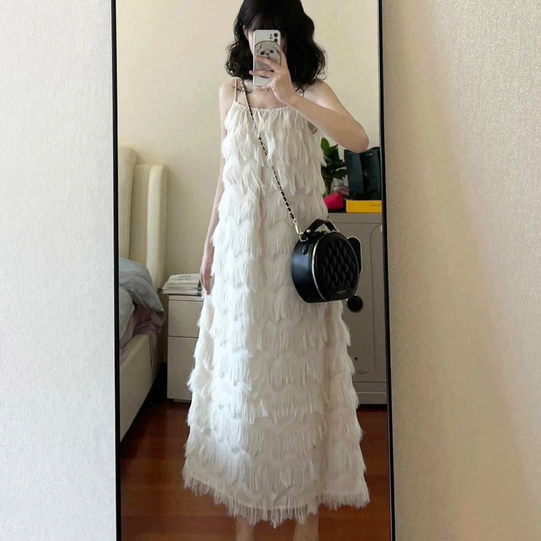 度假风高级感吊带流苏白色连衣裙子女夏季新款法式女神名媛吊带裙