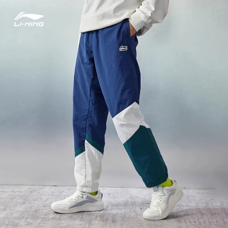 李宁运动裤男女百搭秋季2025潮流收口宽松撞色情侣运动男士长裤
