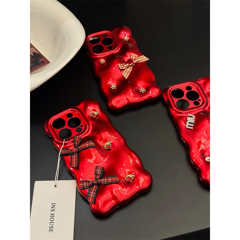 适用苹果系列iPhone15新年红14pro陨石格纹蝴蝶结13p新款12手机壳