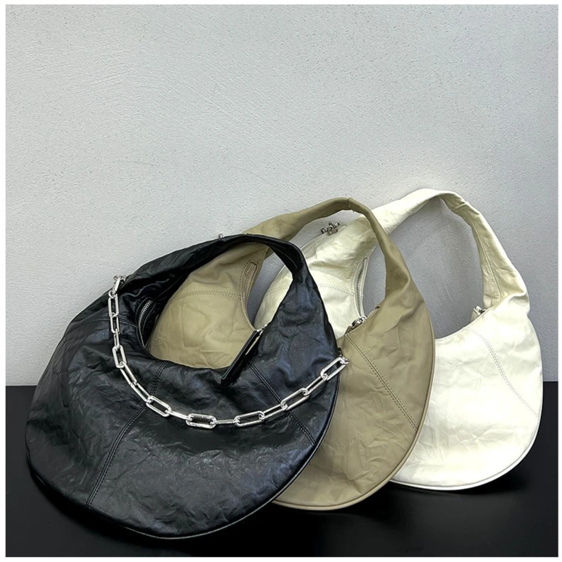 头层牛皮重工褶皱工艺单肩斜挎手挽大月牙包