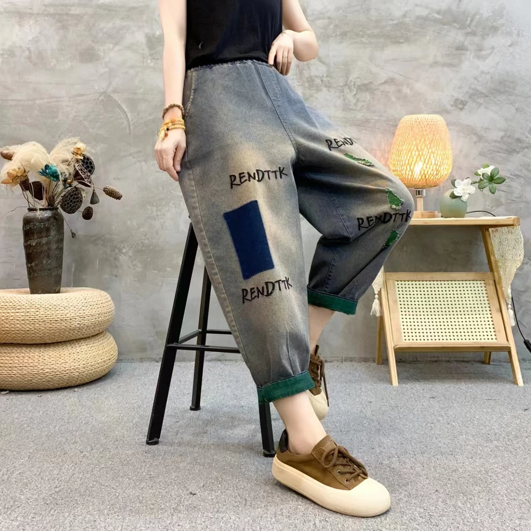 夏季薄款软牛仔裤裤子大码休闲夏季宽松破洞哈伦裤字母绣花8801