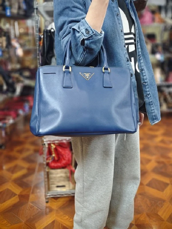 95新 Prada/普拉达 蓝色手拎包/FC11817058/7058