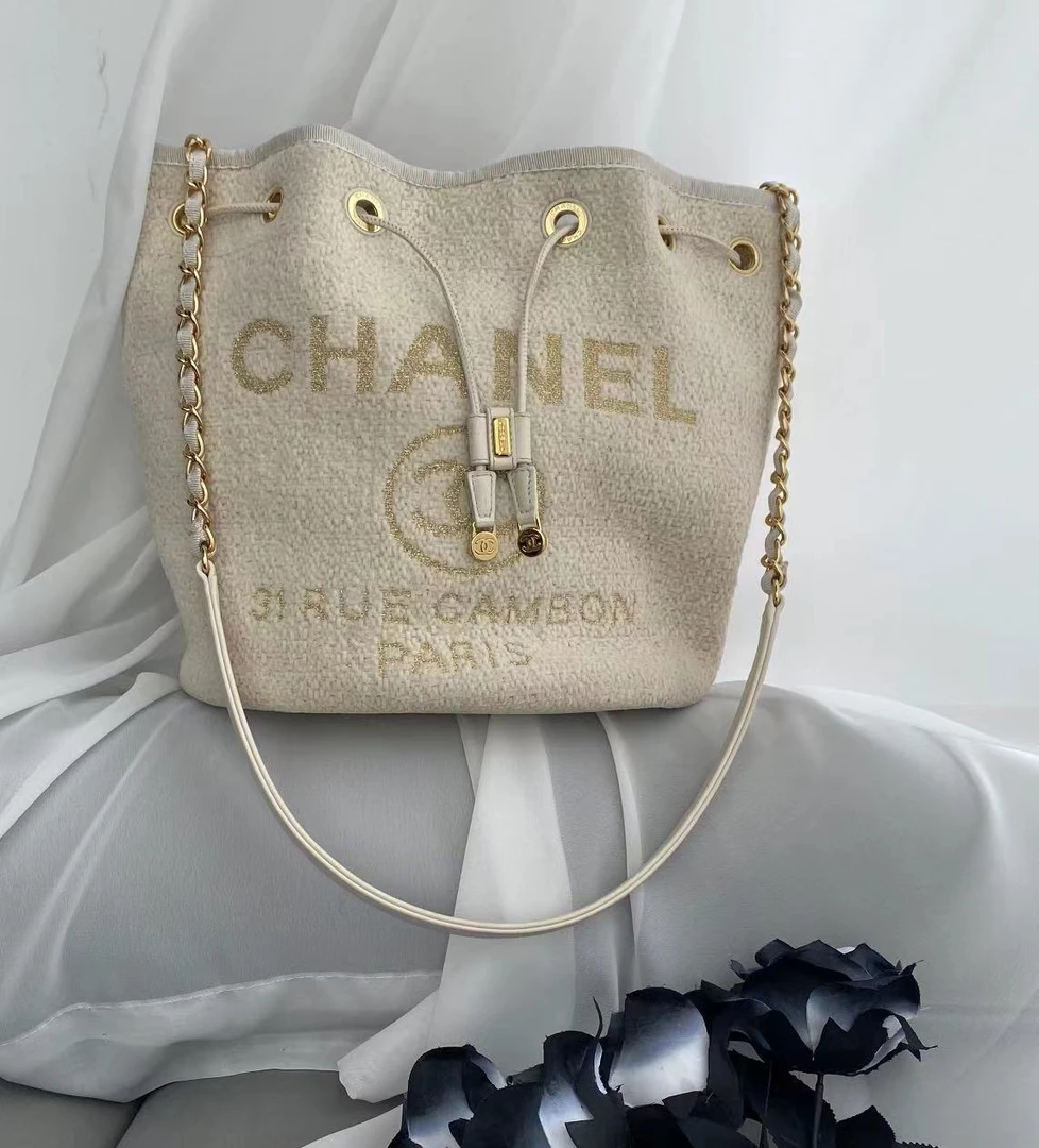 99新 Chanel/香奈儿 chanel米白抽绳水桶单肩包/公价无/甄选