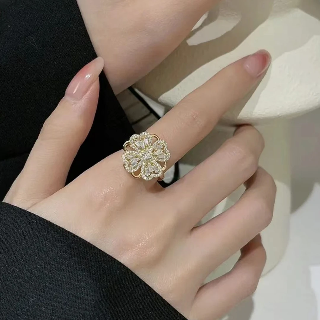 钛钢合成锆石戒指 2025火爆女旋转四叶花戒指轻奢精致高级感6712