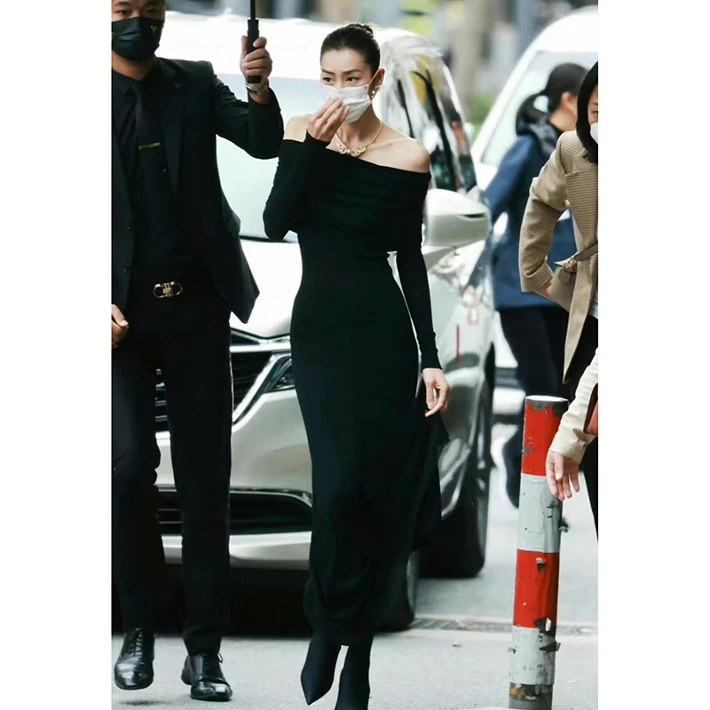 黑色性感气质长袖一字肩连衣裙女2023秋季新款修身显瘦长款包臀裙