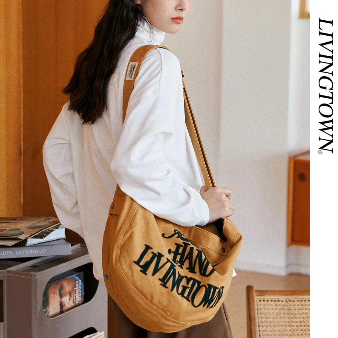 LIVINGTOWN/理文唐复古通勤日系休闲帆布刺绣男女报童单肩斜挎包