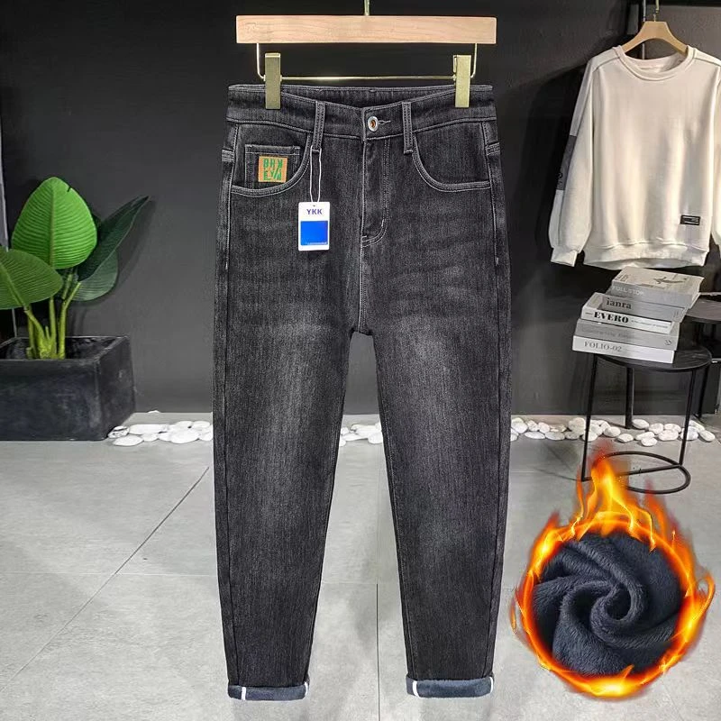 高端轻奢加绒加厚牛仔裤男修身小脚韩版潮流宽松弹力保暖哈伦长裤