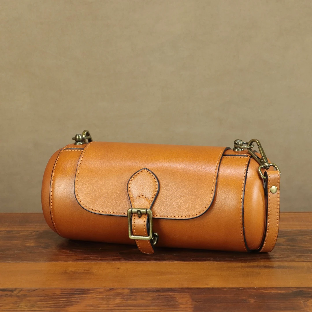 头层植鞣牛皮真皮女士复古风百搭单肩斜挎翻盖巴比龙腰鼓圆筒包包