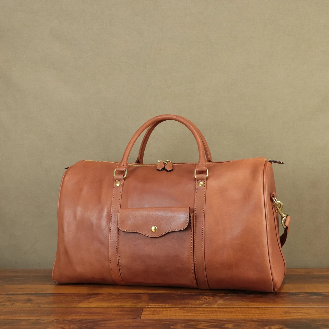 头层牛皮简约复古时尚女士真皮手提单肩斜跨洗水旅行包包