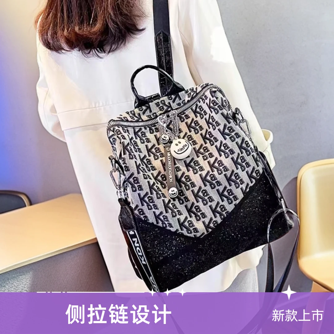 新款字母烫钻布艺轻奢双肩背包女士斜挎多功能学生潮流轻便旅游