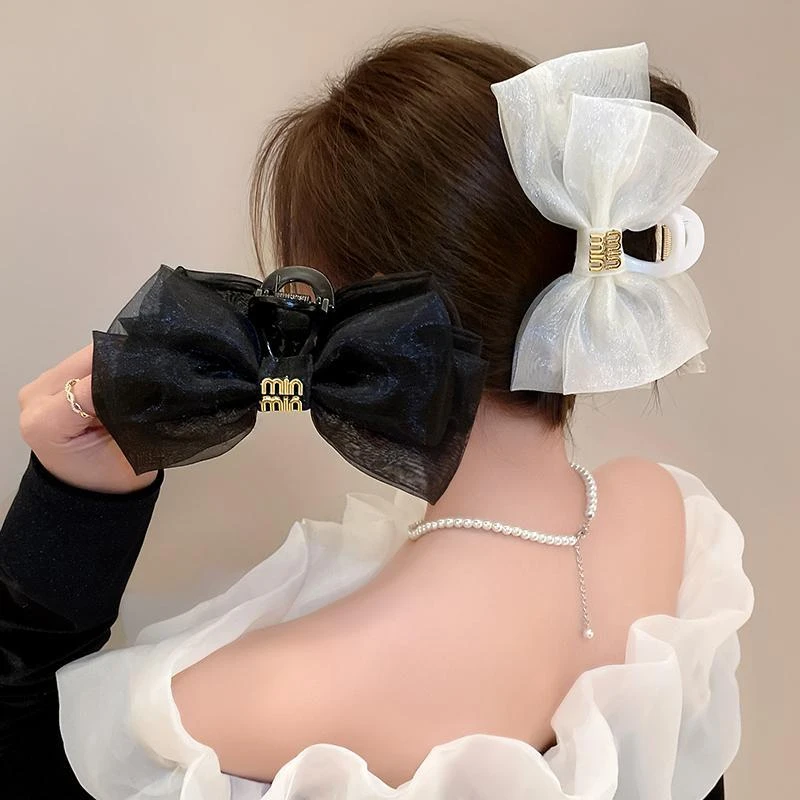 日韩蝴蝶结抓夹女在逃公主气质优雅水钻鲨鱼夹后脑盘发卡头饰品