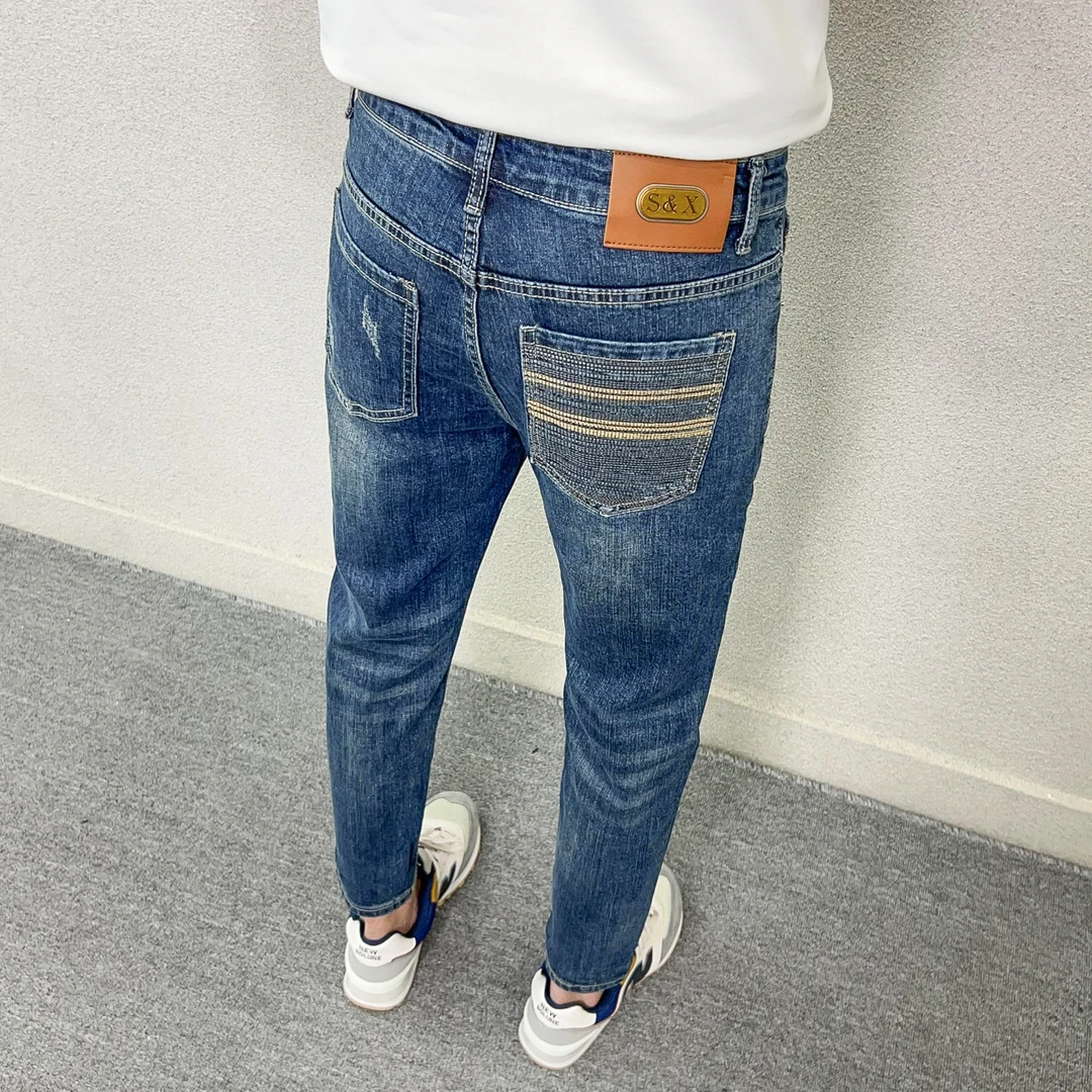 高端九分牛仔裤男款秋季爆款轻奢潮牌复古百搭修身微跨青年小脚裤