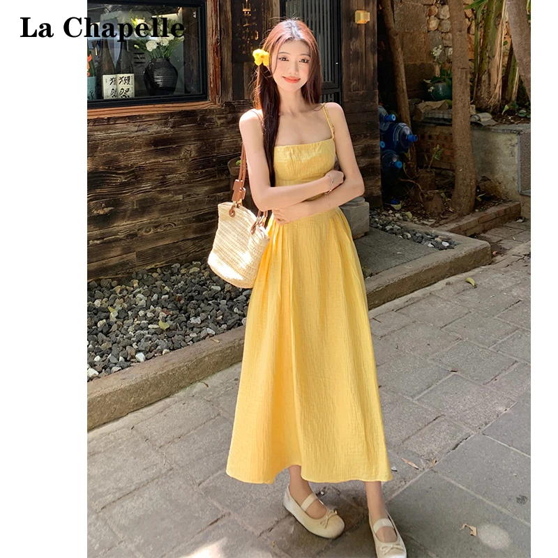 拉夏贝尔温柔风黄色吊带连衣裙女2024年夏季法式气质收腰显瘦长裙
