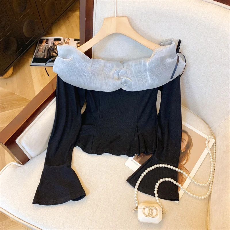 2024早秋季新款高级黑色设计性感一字肩针织衫荷叶边气质上衣女装