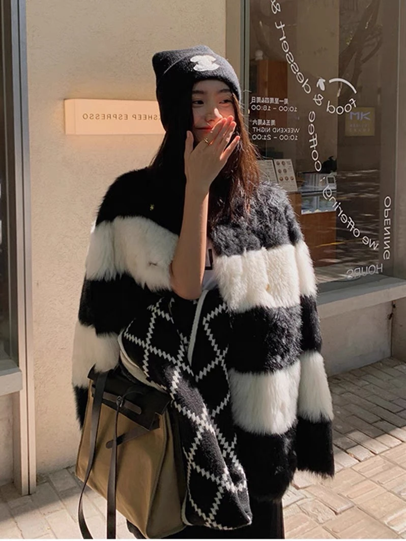 ZQ608黑白拼接撞色进口托斯卡纳皮毛一体外套女中长款